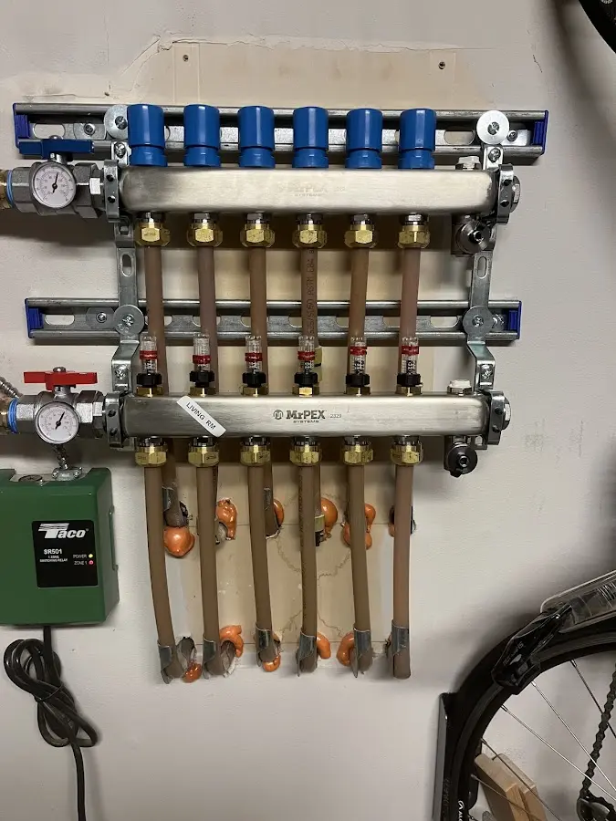 Plumber performing Water Heater Repair at a residential property in Conshohocken